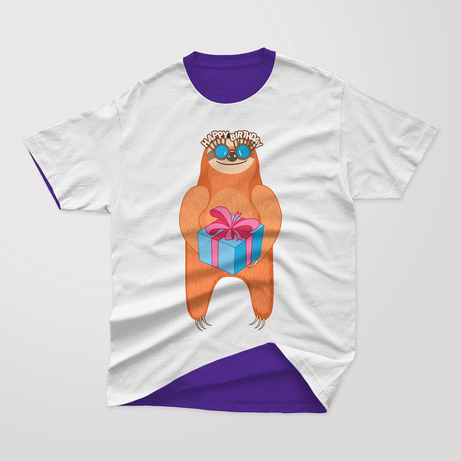 A sloth with a gift is depicted on a light gray T-shirt.