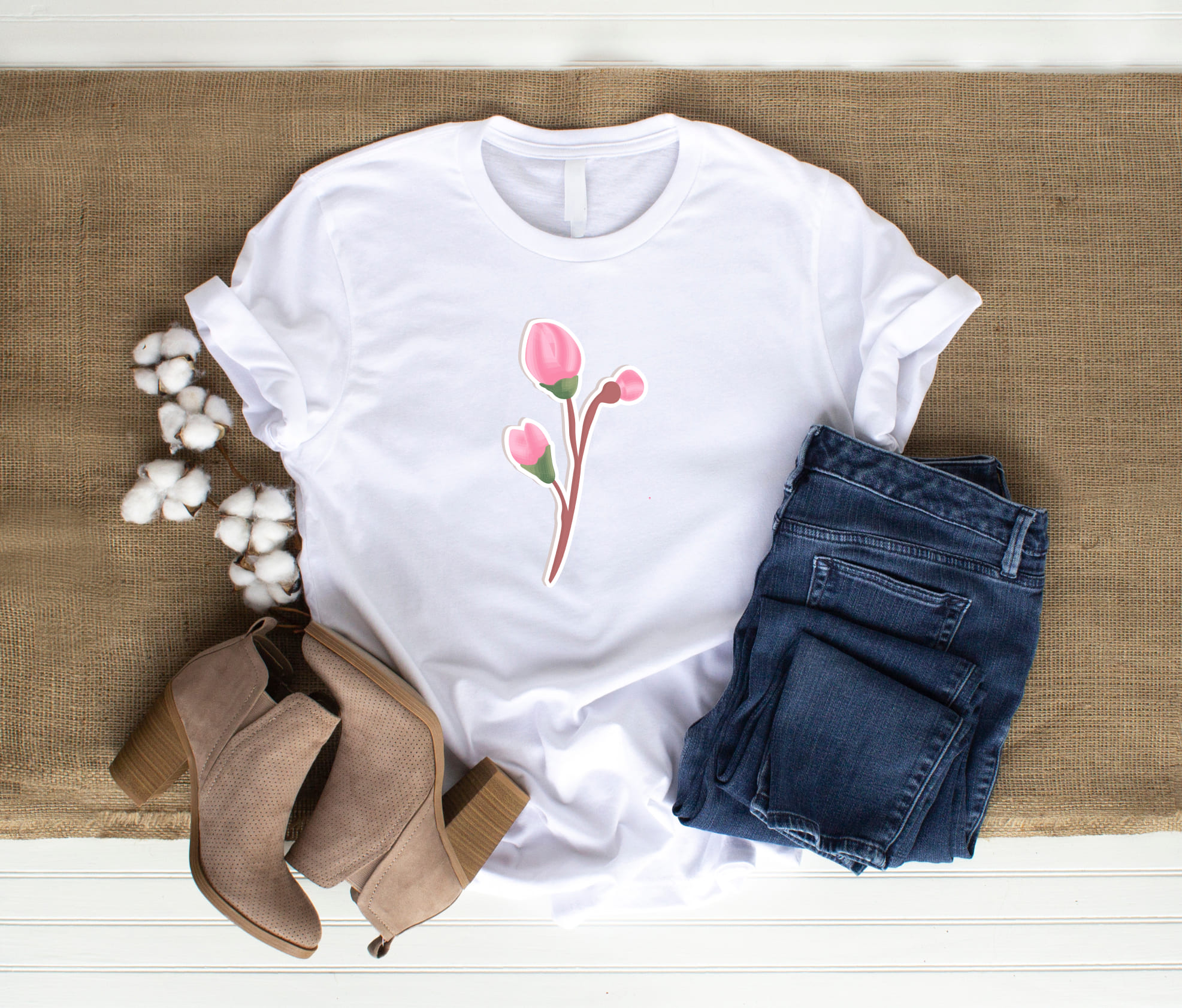 Flowers and other things on a T-shirt.