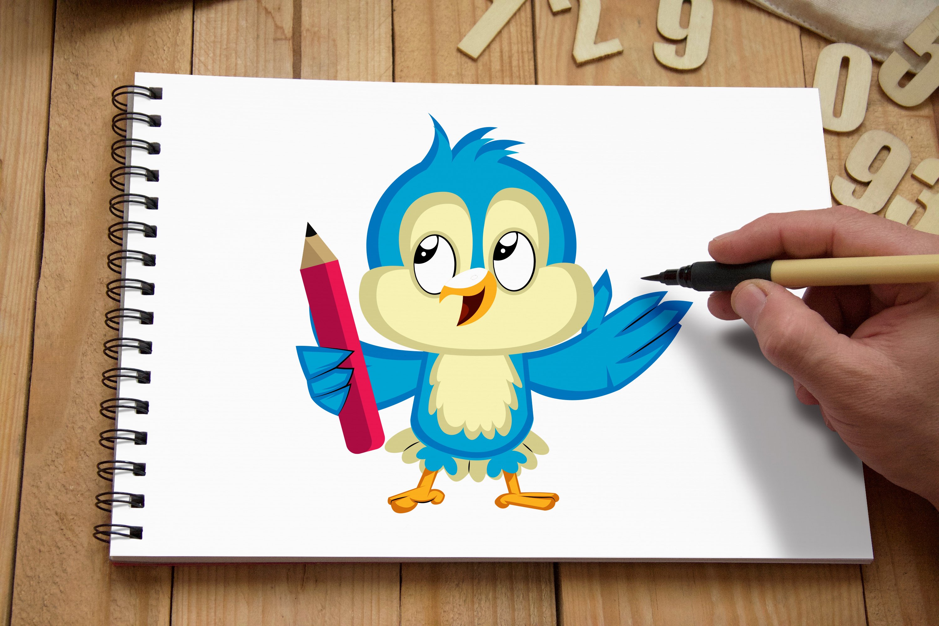 The drawing of a bird on a piece of paper is large.