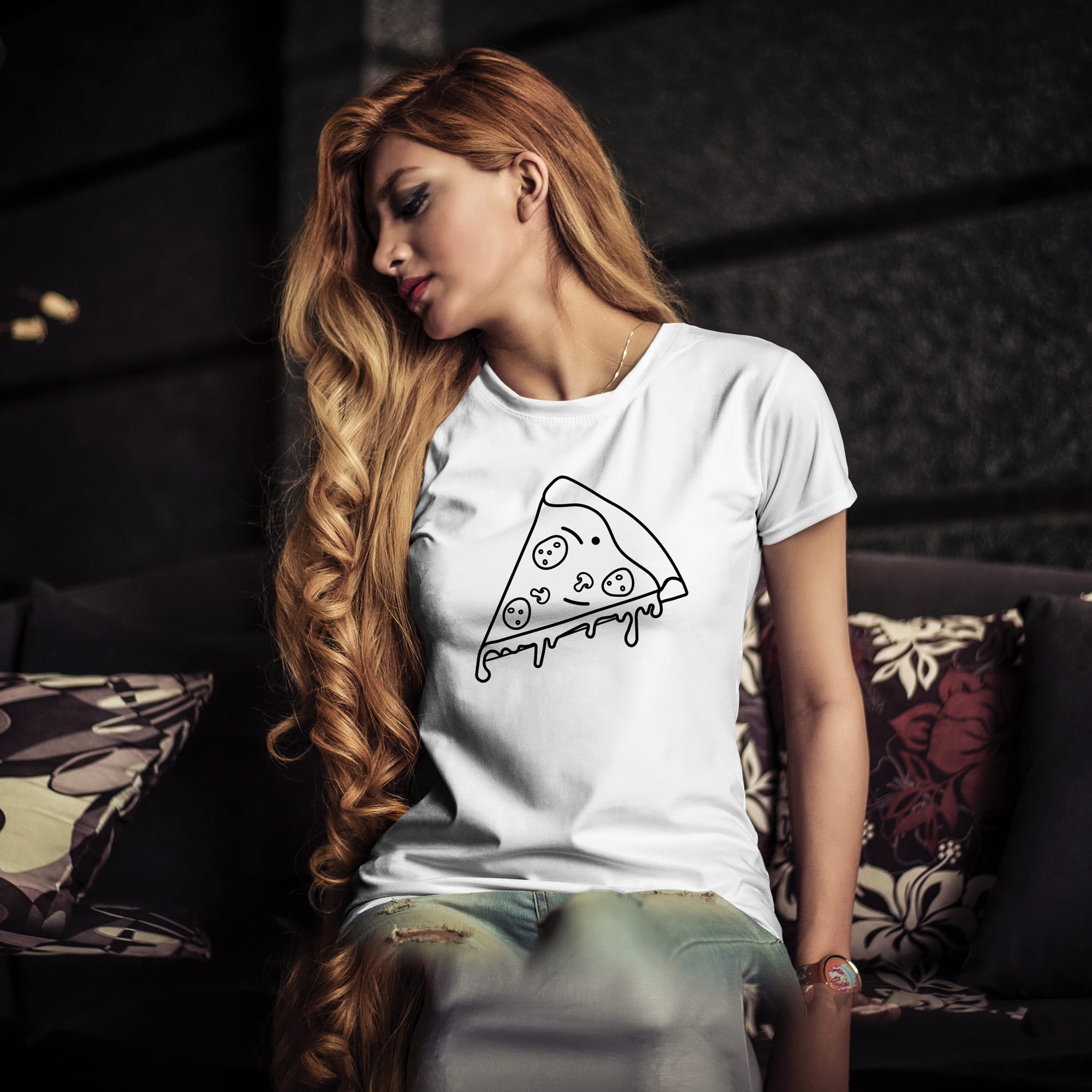 A piece of pizza is drawn on a white girl's t-shirt.
