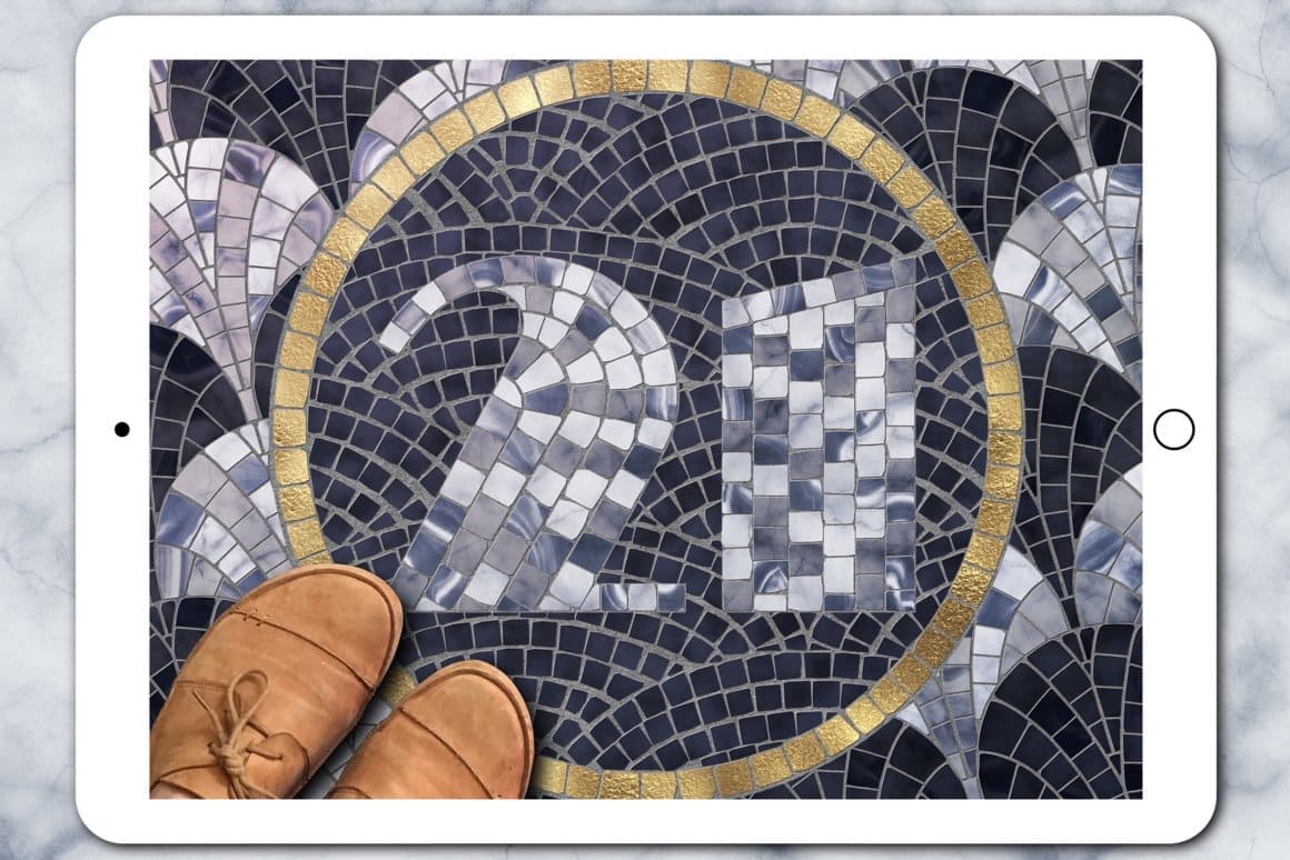 The number 21 is laid out in mosaic on the floor and brown shoes on it.
