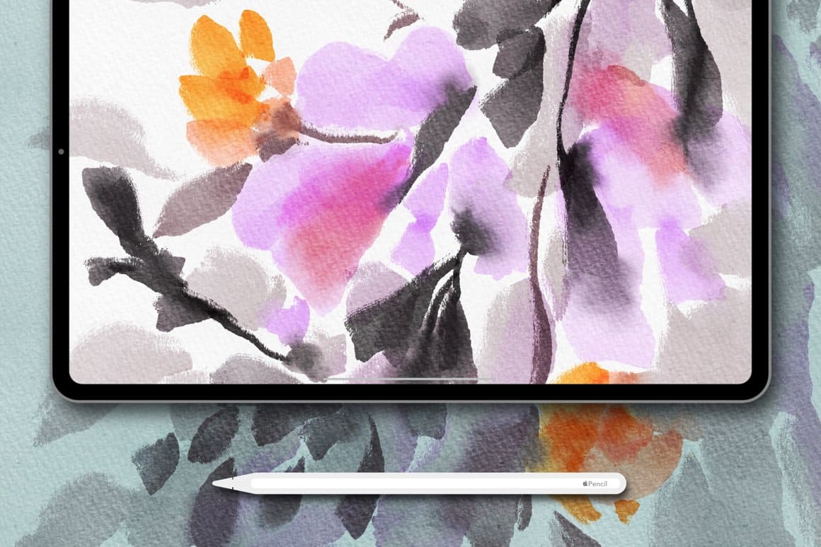 A watercolor drawing of flora is drawn on the tablet.