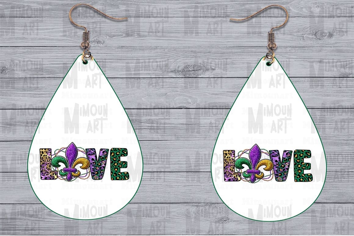Earrings in the form of drops on which the word "Love" is written.