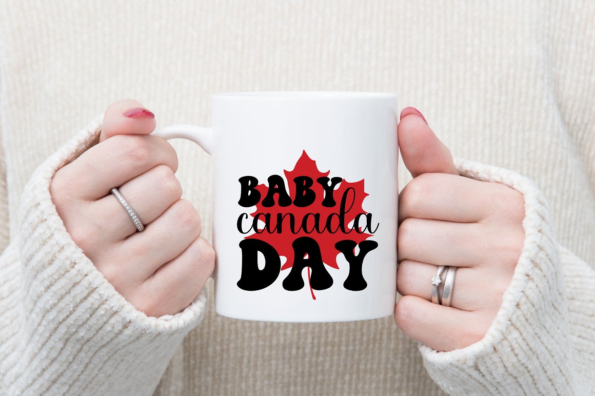 Cup with a print of a child of Canada.