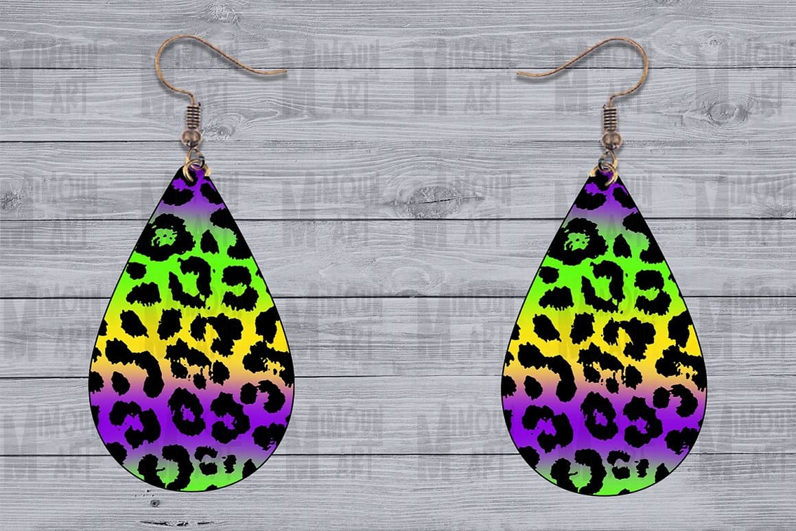 Bright earrings with black leopard spots.