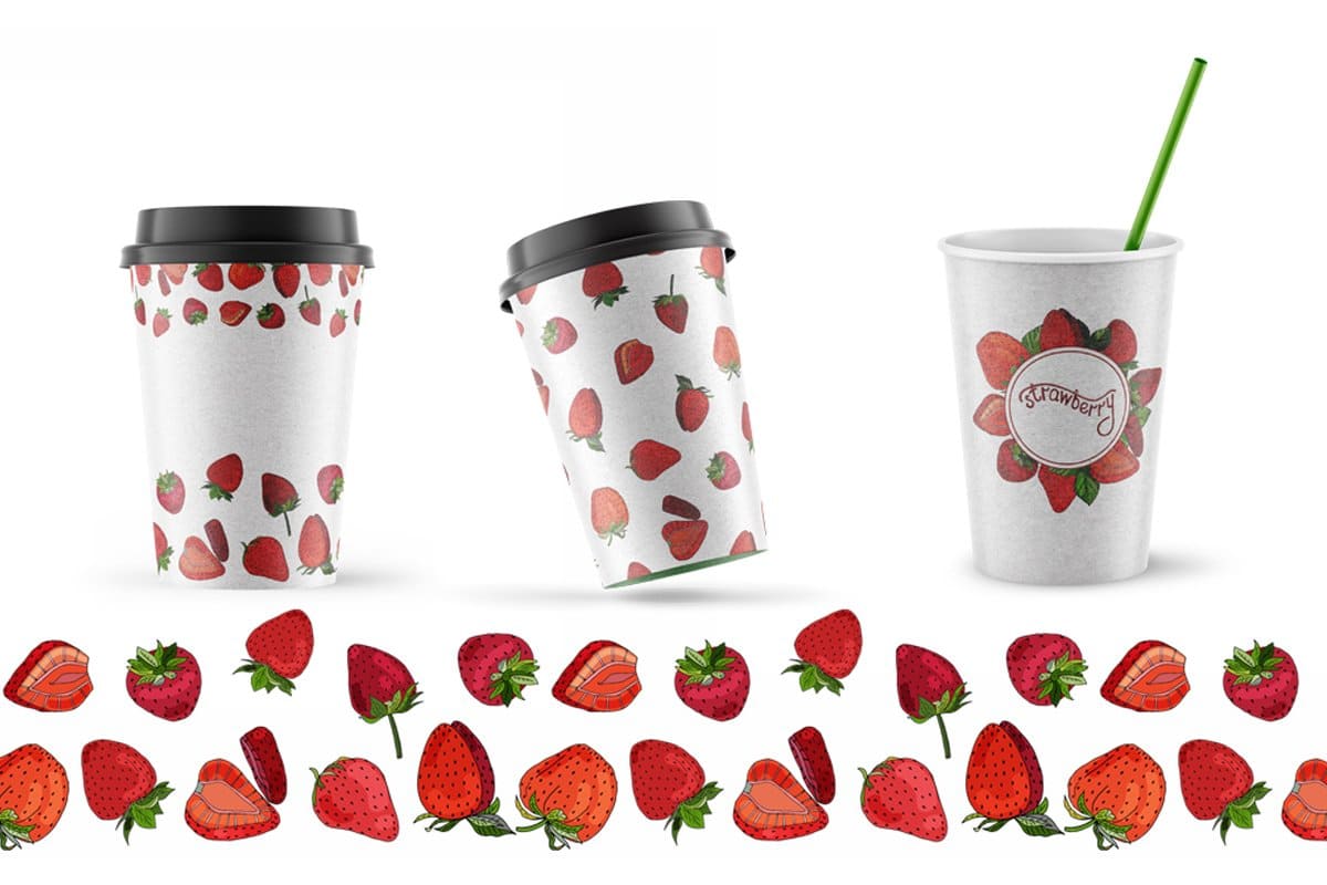 White cups for coffee with the image of a red strawberry.