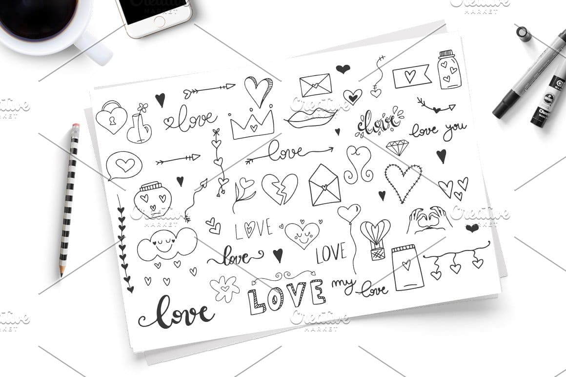 The contours of hearts, clouds, cupid's arrows are depicted on a white sheet of paper.