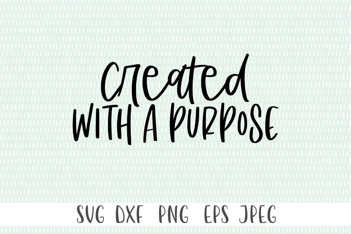 The inscription "Created with a purpose" in a white dash against a light blue background.