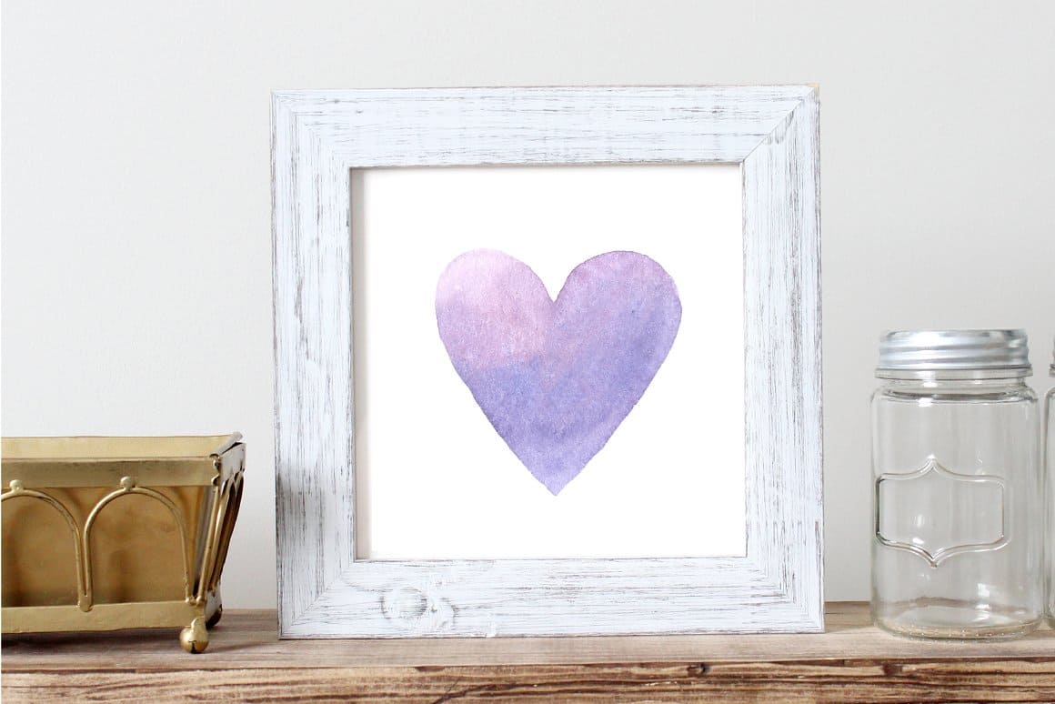 An image of a purple watercolor heart on a painting.