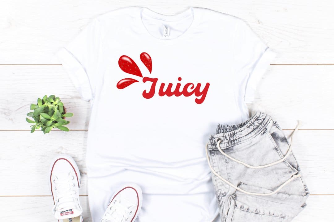 The word juicy is written in red on a white T-shirt.