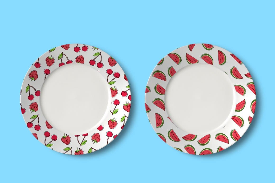 White plates with a berry frame.