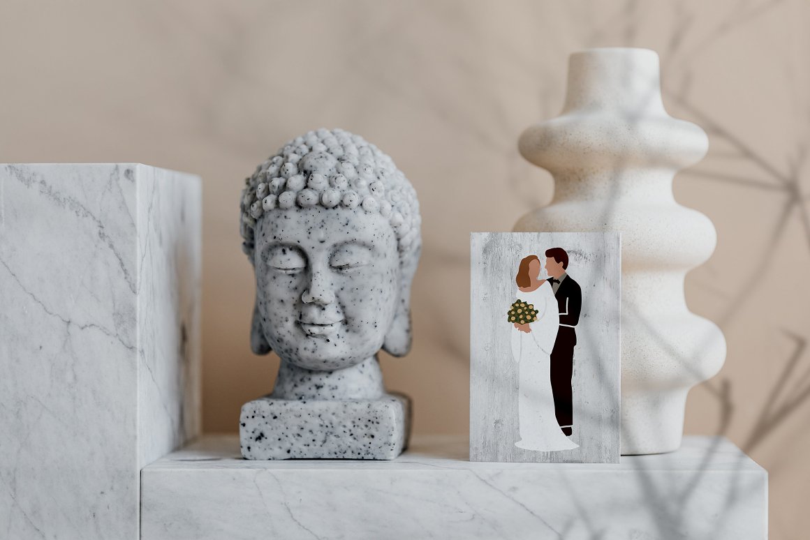 A Buddha sculpture and a picture from a wedding.