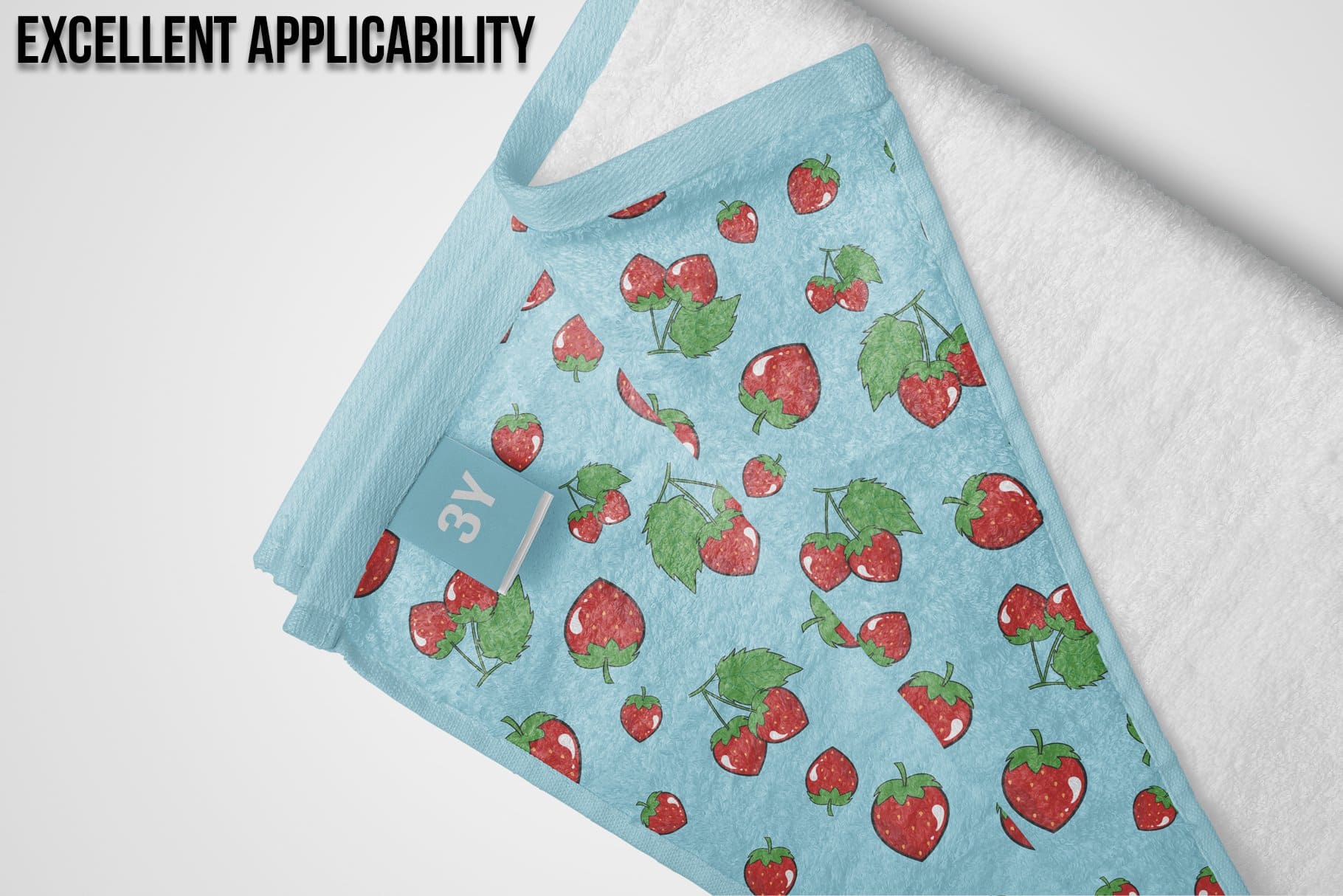 Light blue towel with a strawberry pattern.
