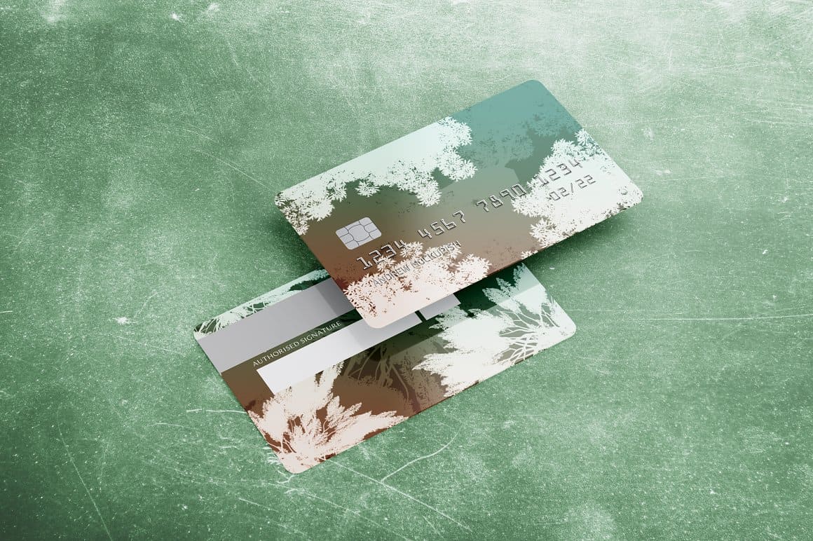 Two bank cards with the image of trees.