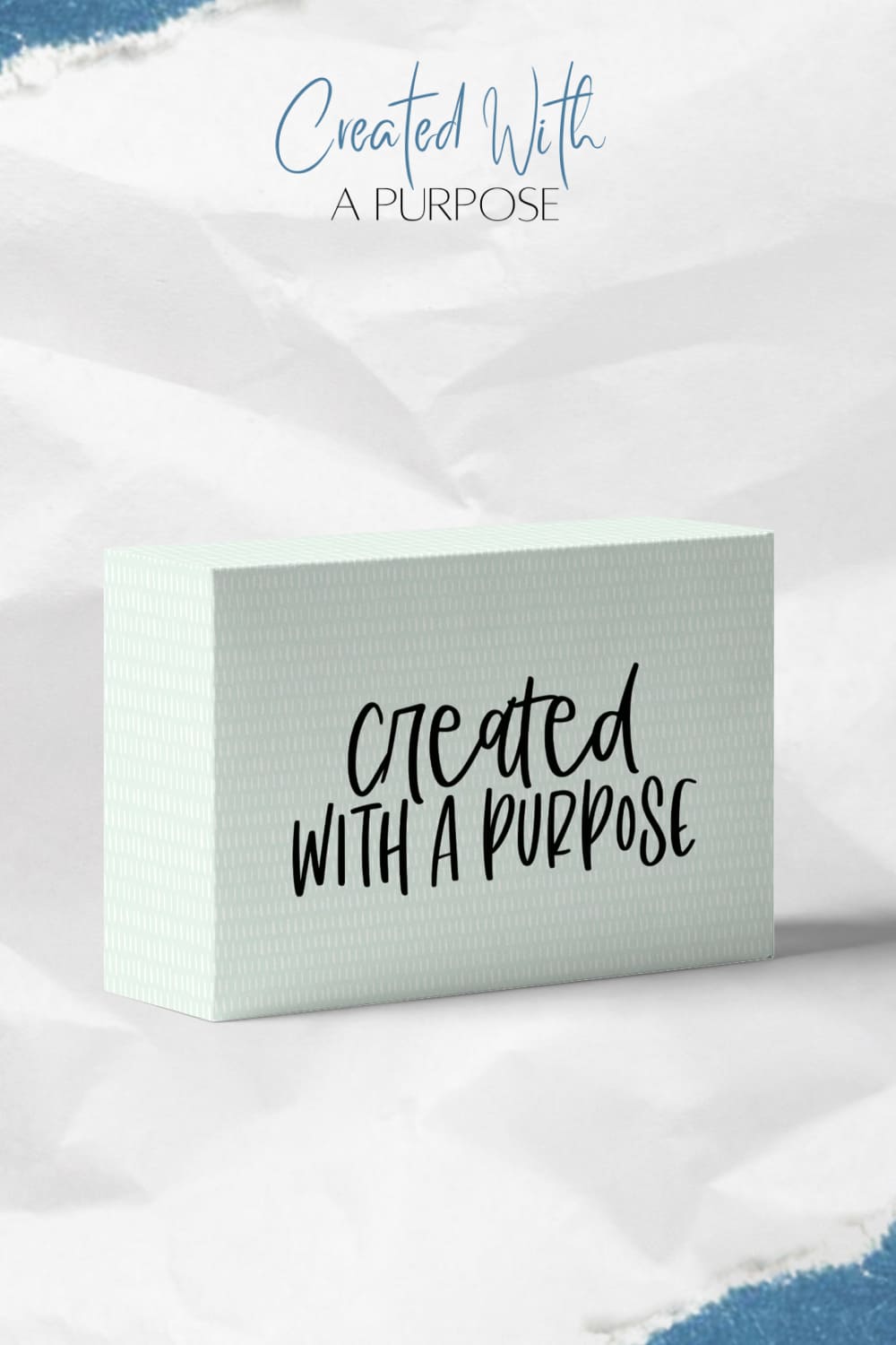 The cardboard box is marked "Created with a Purpose".