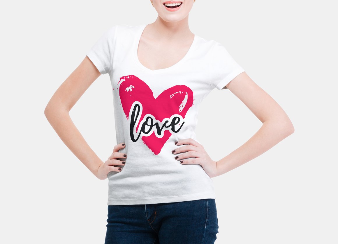 White t-shirt with a red heart.