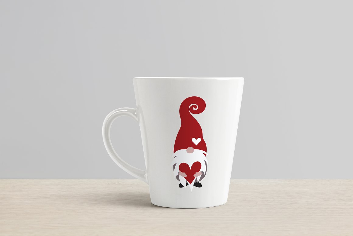 A cool print on a cup with a gnome.