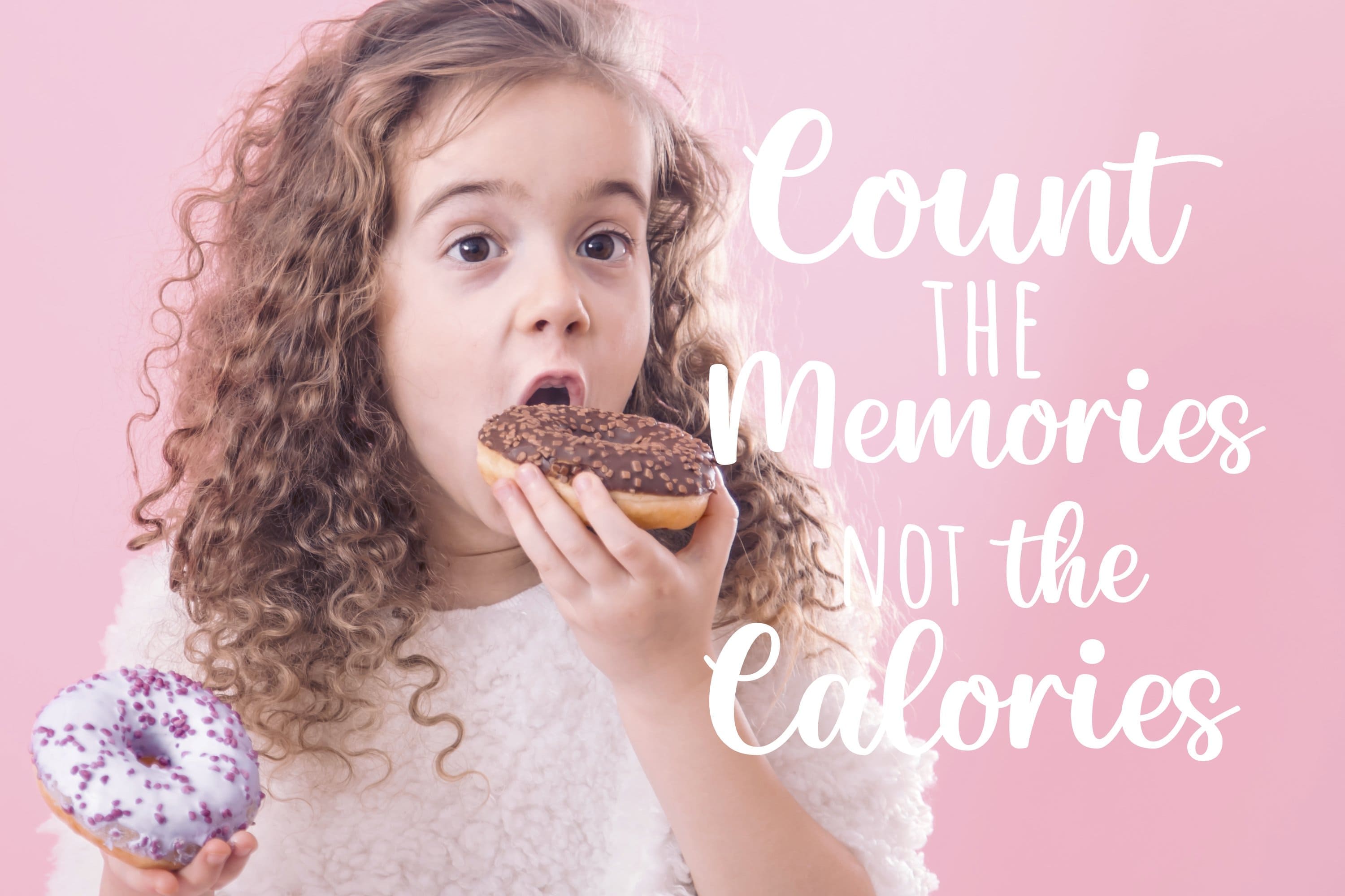 A girl tastes a "Count the Memories not the Calories" donut.