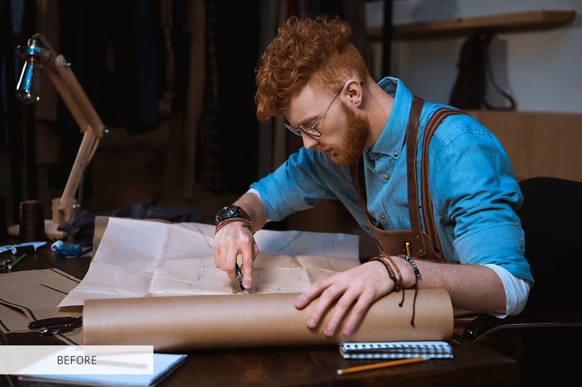 Photo of a red-haired man who is engaged in drawing, photo for processing in Photoshop.