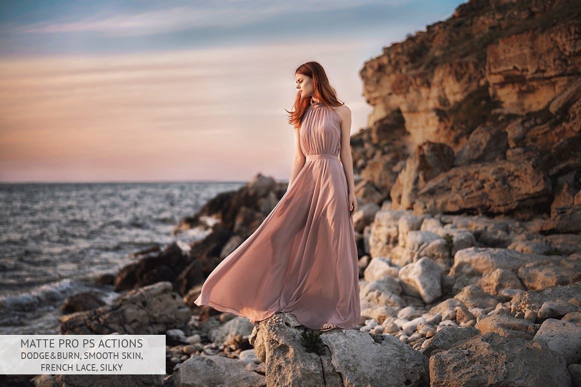 A girl in a silk dress stands on a stone bank using Matte Pro.