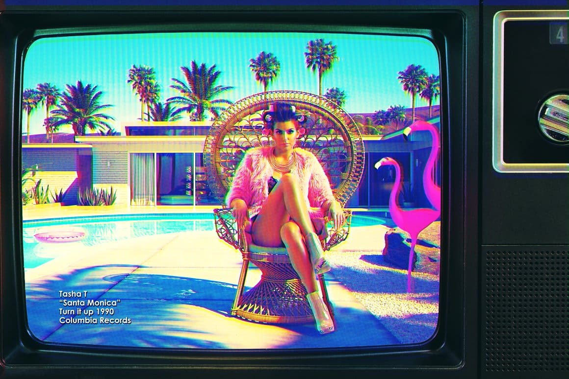 An old TV shows a girl sitting on a decorative chair, with two pink flamingos nearby.