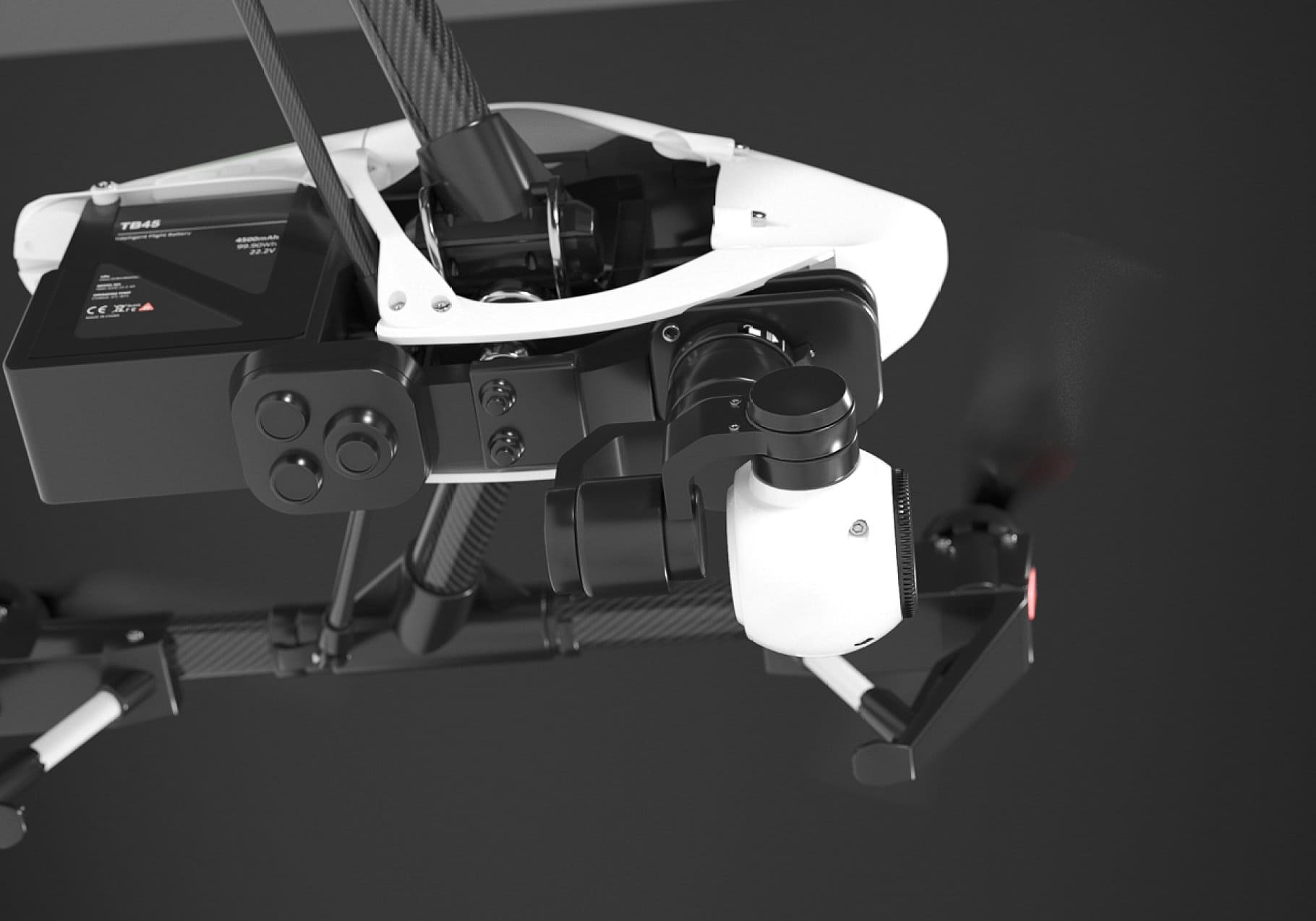 Part of the quadcopter is depicted on a black background.