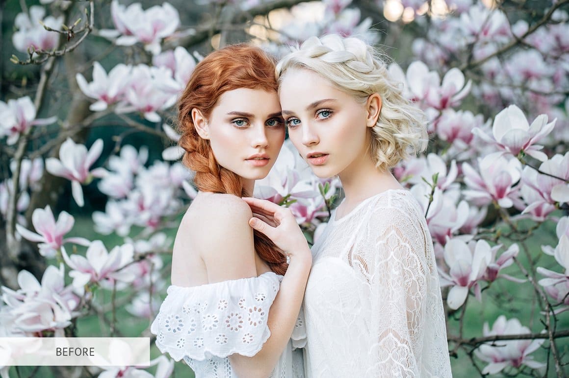 Image of two fragile girls on the background of magnolias.