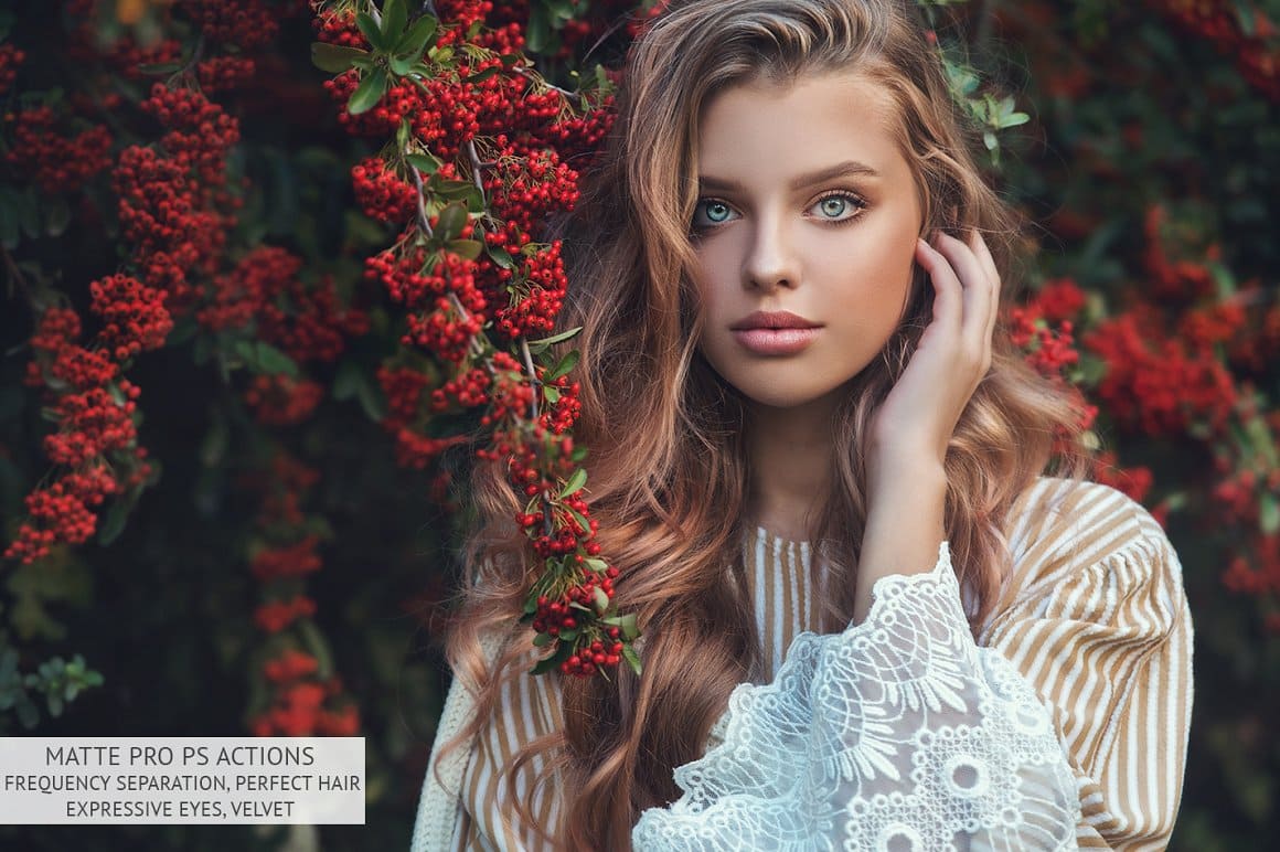 A girl stands near red berries with perfect hair, skin and a lively look using Matte Pro.