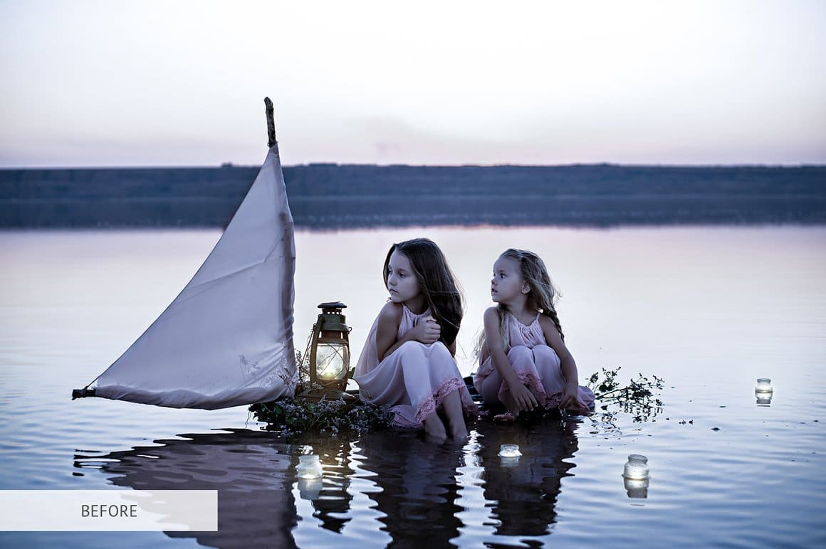 A pale image with two girls blowing candles on water.