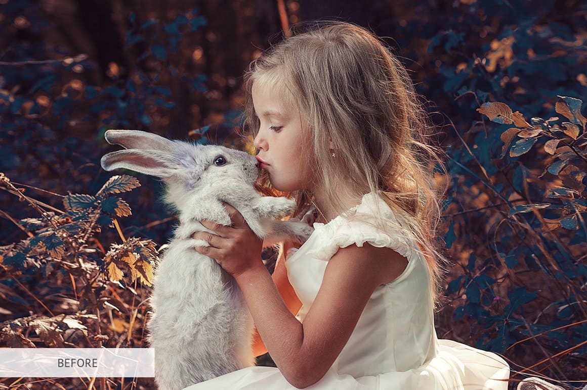 Photo of a girl kissing a rabbit without Photoshop effect.