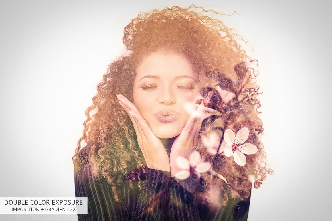 Photo of a curly girl with flowers in her hair.