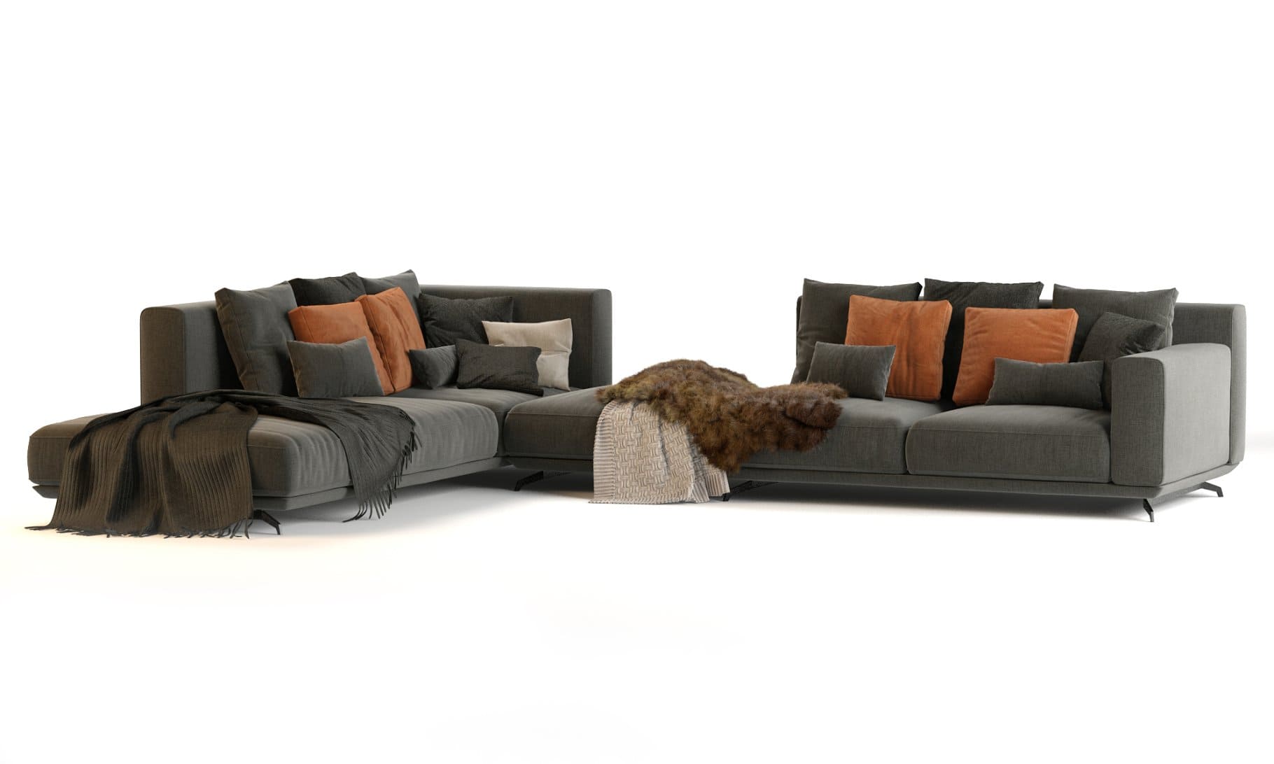 Cashmere and fur blankets on the Dalton Sofa by Ditre Italia.