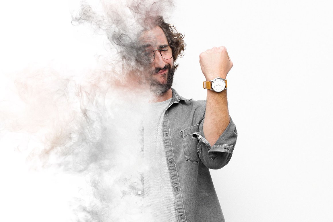 A man in a shirt and a yellow watch.