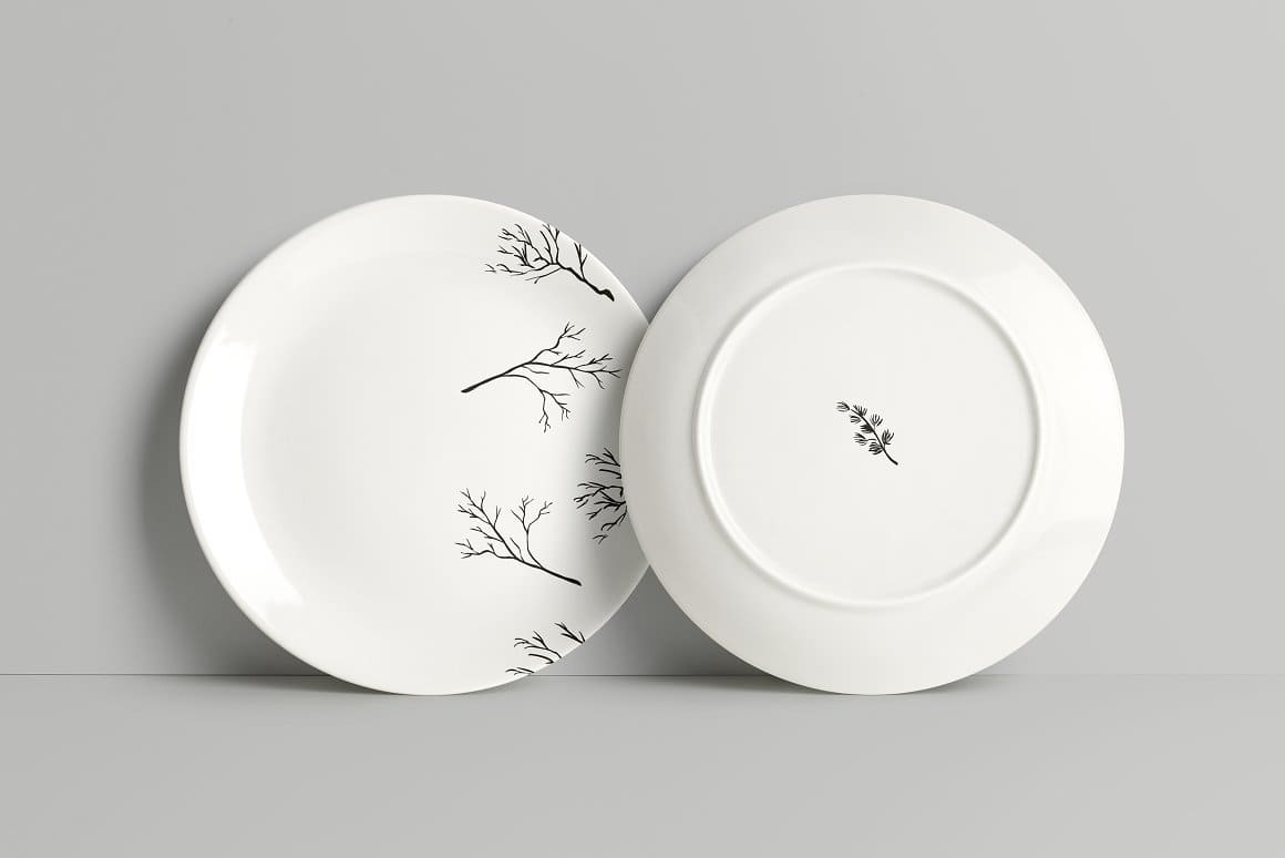 Two white plates with Branches Ink Painted.