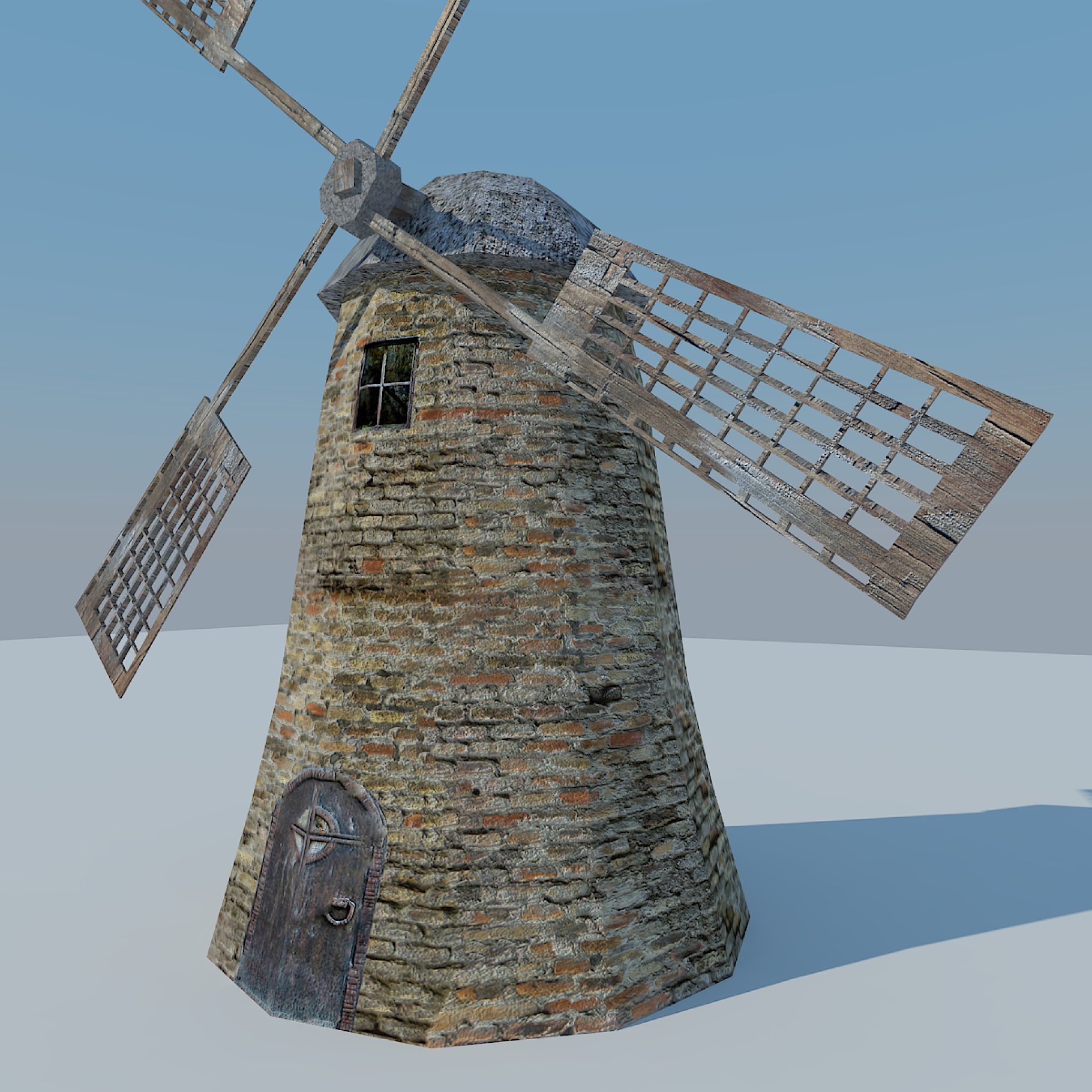 Image of a windmill with stones.