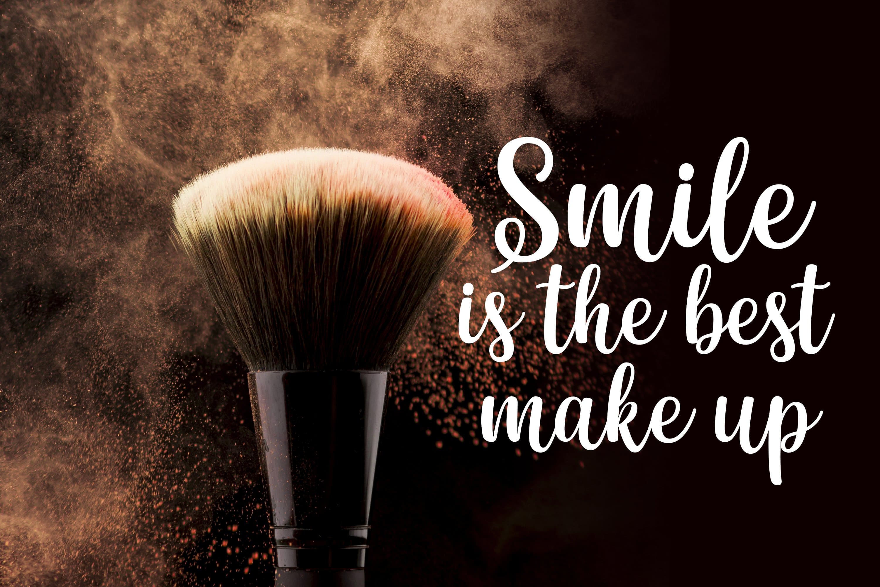 Dark slide with inscription "Smile is the best make up".
