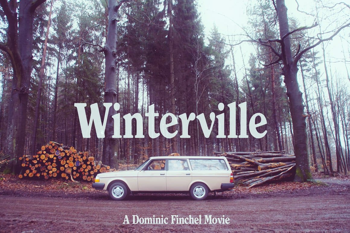 An image of logging in the forest, a white car and the inscription "Winterville a dominic finchel movie".