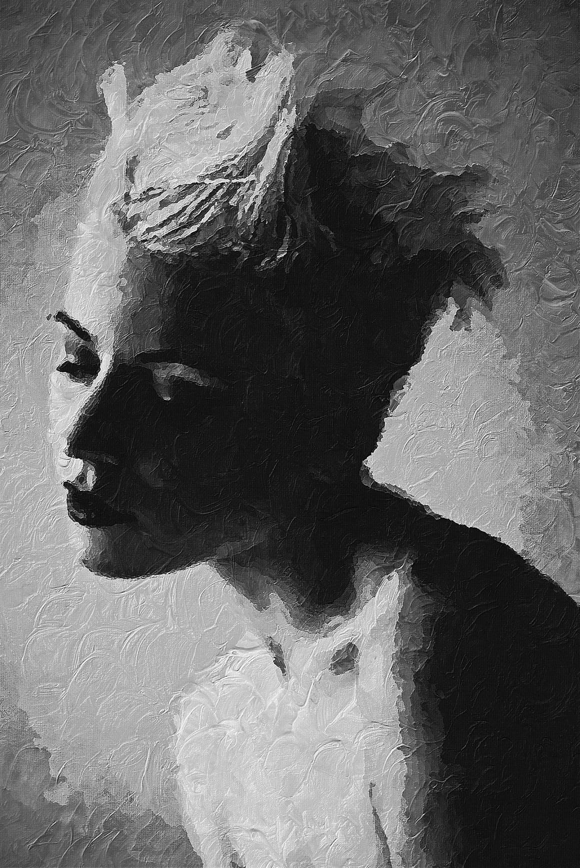 An image of an attractive woman with short hair is reworked in Palette Knife Photoshop Action.