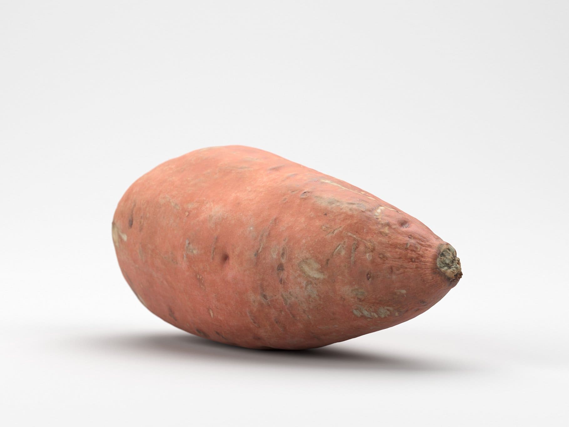 Realistic pink potato on a white background.