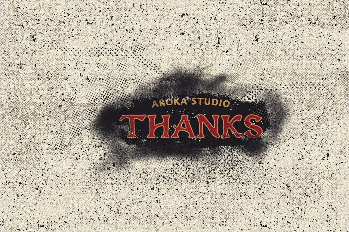 Black paint with the inscription “Aroka studio Thanks” is sprayed on a white background.