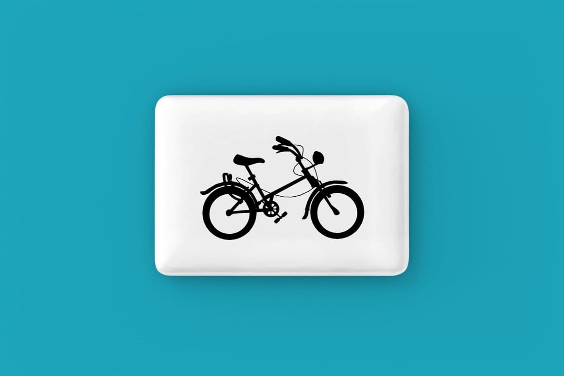 Silhouette of a bicycle on a white magnet with a turquoise background.