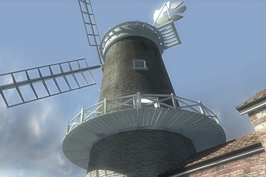 A round tower with a windmill and a satellite dish.